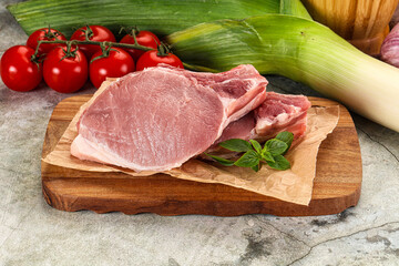 Raw pork steak loin with bone