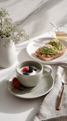 Speckled Green Yogurt Bowl with Berries and Avocado Toast