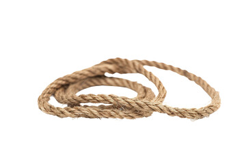 Obraz premium Coiled brown rope isolated for climbing or crafting purposes