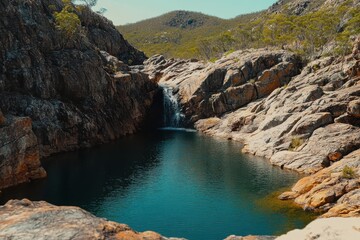 Rocky pool and waterfall