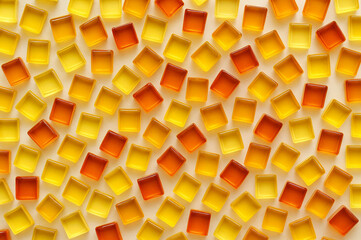 Array of yellow and orange square tiles suitable for backgrounds, interior design concepts, decorations, pattern designs, and tile flooring illustrations.