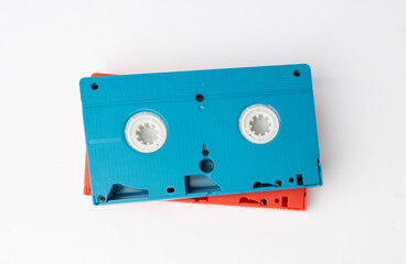 An old colored vhs tape isolated on a white backgraund. 