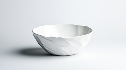 An elegant white bowl showcasing a stylish design, featuring soft curves and a modern aesthetic, perfect for contemporary home decor or culinary use.