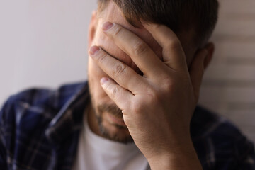 Depressed man at home. Mental health problem
