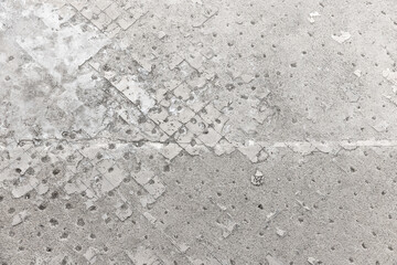 Detailed close-up of an aged concrete surface, background texture