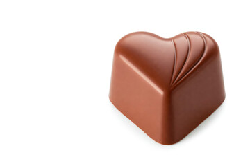 Heart-shaped chocolate candy on a white background. Space for text.