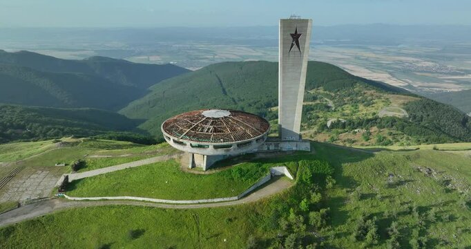 Circular tracking right direction aerial of Buzludzha Monument, built in 1974 in central Bulgaria by the Bulgarian communist government, abandoned in the 1990s, Bulgaria, Balkan's, southeast Europe