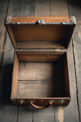 Obraz premium Top View of Empty Vintage Wooden Luggage