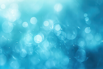 Blue abstract background with bokeh lights, creating a dreamy and ethereal effect.