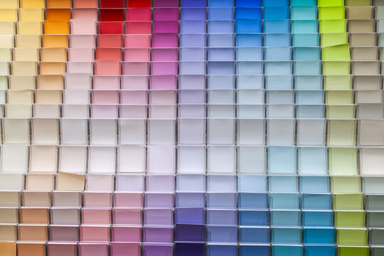 Colourful rows of house paint sample cards at hardware shop