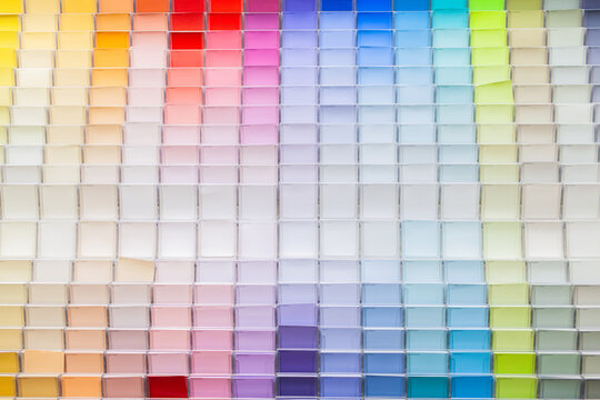 Colourful rows of wall paint samples at hardware shop