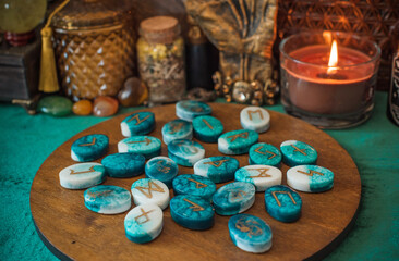 Nordic Runes Divination with Candle Turquoise color, esoteric concept