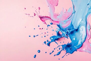 Pink and blue paint splashes on a pink background, with copy space concept.