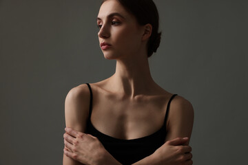 Fototapeta premium Woman with perfect skin on grey background