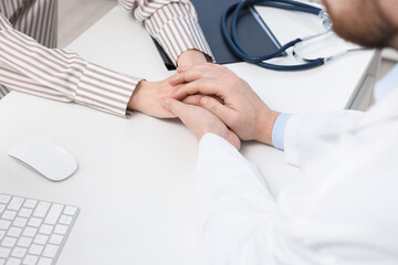 Dependent woman having appointment with addiction specialist in clinic, closeup