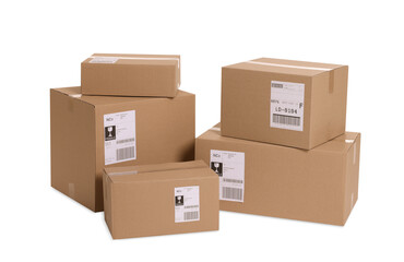 Many parcels with shipment labels isolated on white