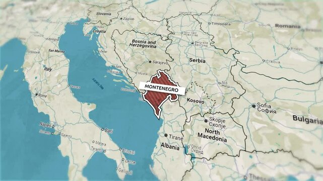 Borders of the state of Montenegro on the map. Country Montenegro on the map is highlighted by a polygonal border. From above zooming in with panoramic view
