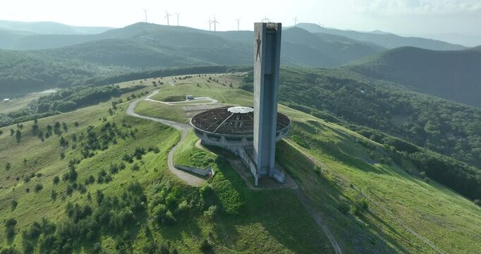 Circular tracking right direction aerial of Buzludzha Monument at sunrise, built 1974 in central Bulgaria by the Bulgarian communist government,abandoned in the 1990s, Bulgaria, Balkan's, Europe