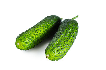 Green fresh cucumbers isolated on white background. Healthy eating concept.