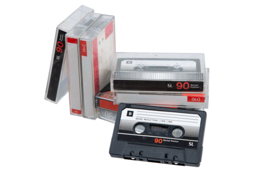 Close-up of an audio cassette with a sticker without text.  Analog storage medium. Cassettes for audio recordings and music.