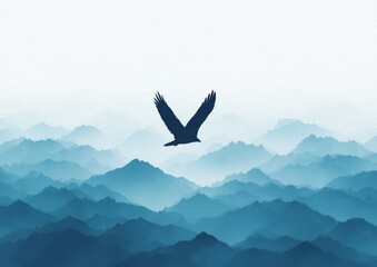 Fototapeta premium A Bird Soaring Above Blue Mountains