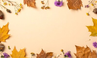 Autumn's Gentle Frame Dried Leaves, Acorns, and Cornflowers on a Soft Beige Background with Copy Space