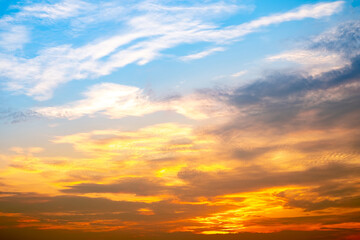 Beautiful , luxury soft gradient orange gold clouds and sunlight on the blue sky perfect for the background, take in evening,Twilight, Large size, high definition landscape photo