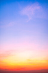 Obraz premium Beautiful , luxury soft gradient orange gold clouds and sunlight on the blue sky perfect for the background, take in evening,Twilight, Large size, high definition landscape photo