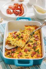 fresh corn pudding casserole in a baking dish