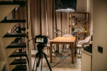 A podcast studio room with professional cameras, microphones and lighting fixtures. Audio and video...