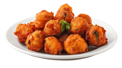 plate of golden-brown. crispy fritters. likely made from a mixture of vegetables and spices. garnished with a sprig of parsley they are served in a casual dining setting. perfect as an appetizer or sn