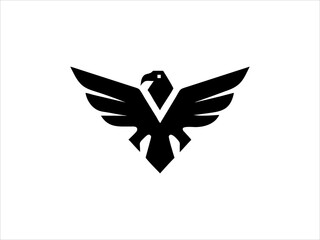 Fototapeta premium A bold, stylized logo featuring an eagle's head and wings, with red wings symbolizing strength and freedom.
