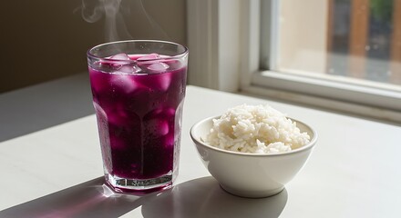 Purple Drink with Ice and Rice Bowl in Sunlight
