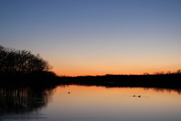 Fototapeta premium sunset over lake