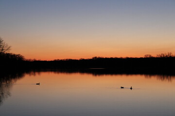 Obraz premium sunset on the river