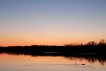 Fototapeta premium sunset over the river
