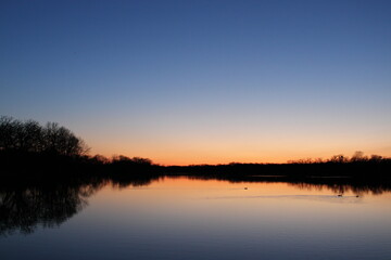 Fototapeta premium sunset over the river