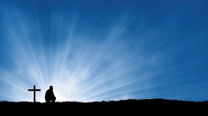 Kneeling silhouette before a wooden cross illuminated by heavenly light in a serene landscape