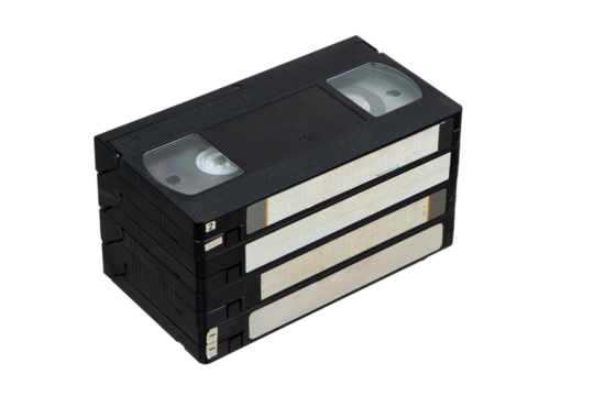 Stack of vintage VHS tapes, retro media storage for movies and home videos.