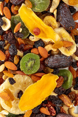 Dried tropical fruits, nuts, and raisins.