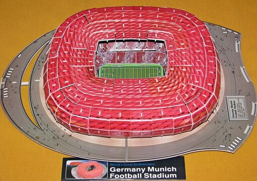 Scale model of Allianz Arena, Munich Football Stadium, showing red inflatable ETFE cushions