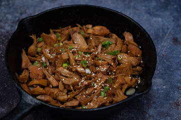 Fried jackfruit as pulled meat vegan in cast iron pan