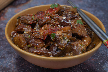 Vegan Korean eggplant side dish gaji namul in serving bowl with chopsticks