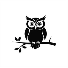 owl sitting on branch
