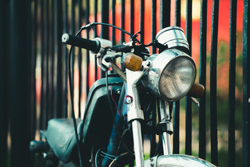 Vintage Motorcycle by the Fence in Moscow 04.19.2025 Moscow, Russia