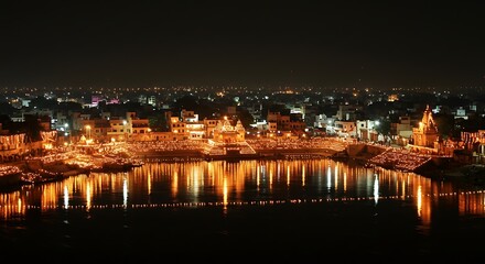 Naklejka premium Illuminated cityscape reflecting on water during a night celebration