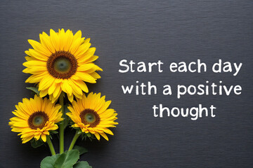 three sunflowers with the words start each day with a positive thought