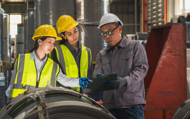 Leader manager talk work order staff engineer technician team in hard hat and uniform safety vest...