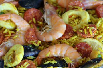 Seafood paella with shrimp, mussels, chorizo, chicken and saffron rice