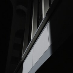 Fototapeta premium Modern Architectural Detail: Monochromatic Building Facade with Blank Panels